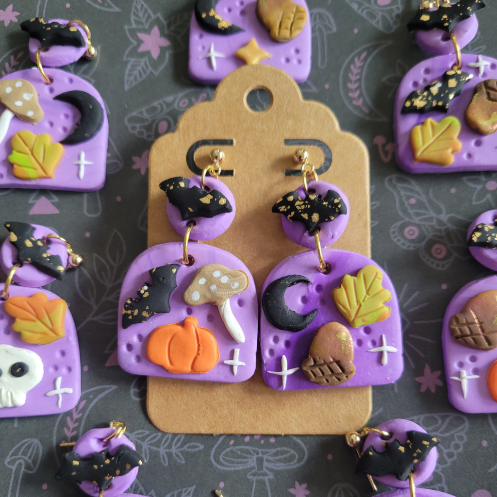 Cute and spooky polymer clay earrings, inspired by nature.